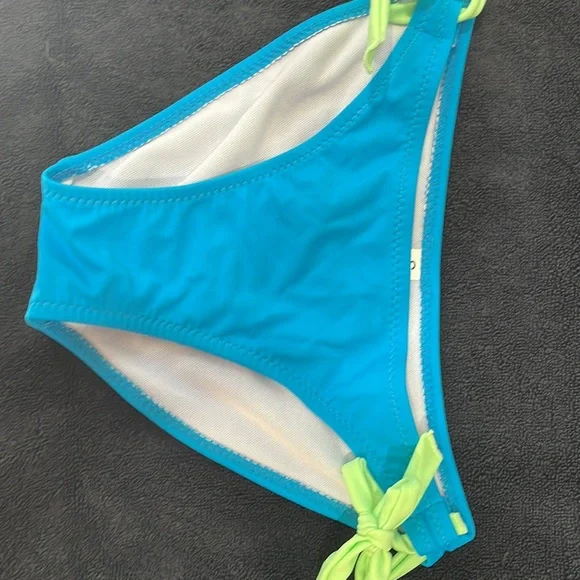 Brand new never worn side tie bikini. Bright turquoise with neon green trim. - Picture 2 of 5